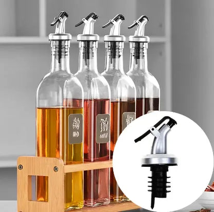 DripControl™ – Olje- & Vinflaskhällare Hemviro